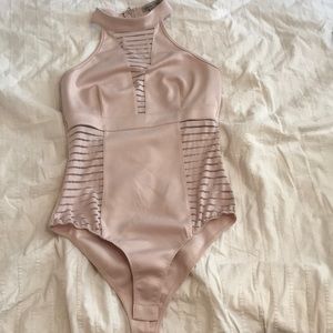 Light pink body suit